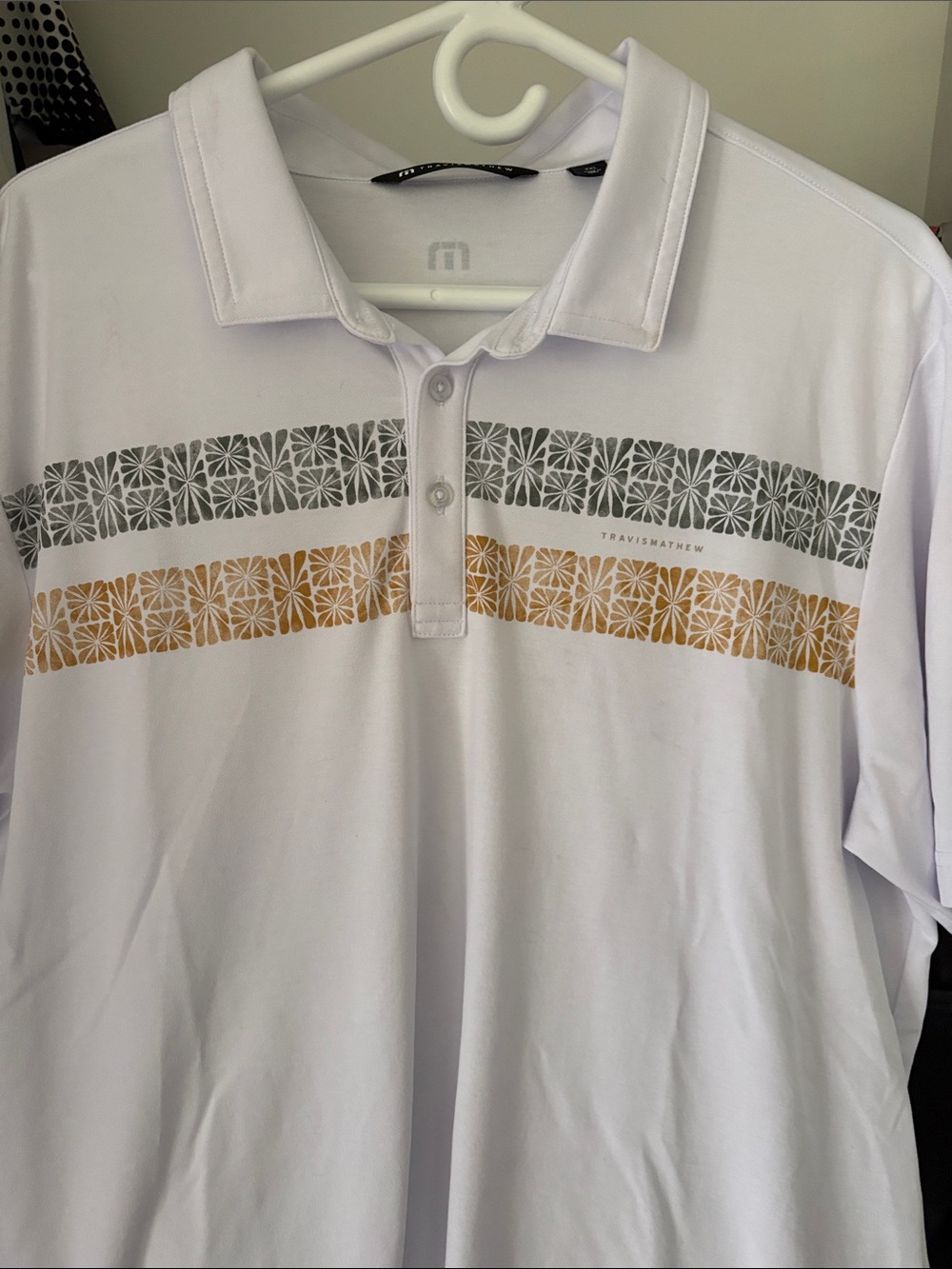 Travis Mathew White Golf Polo with Gray and Gold Patterned Stripes